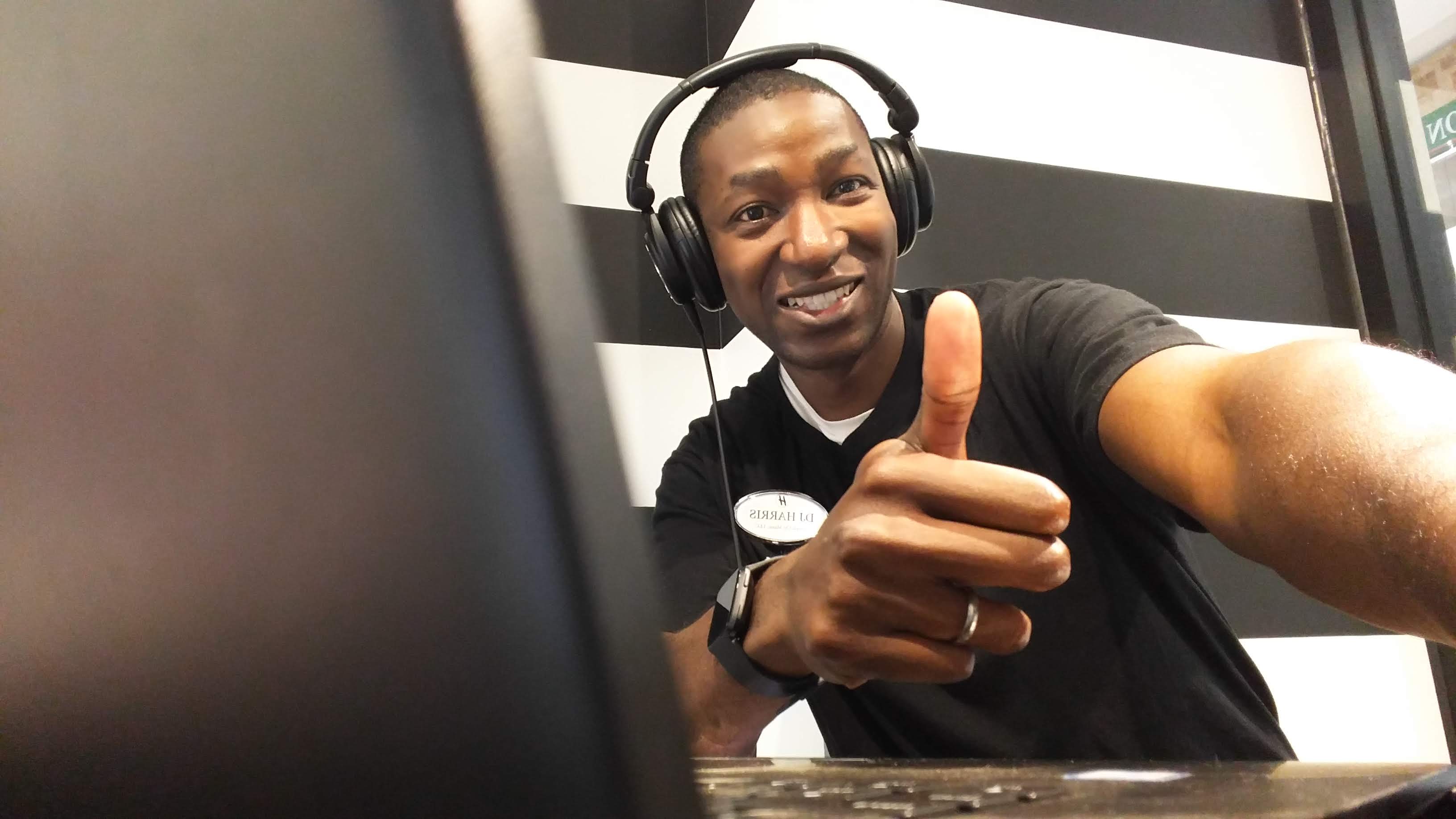 DJ Harris giving a thumbs up at his setup
